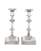 A pair of George III silver square candlesticks by William Abdy I