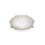 A late George II silver shaped circular salver