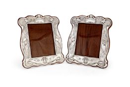 A pair of Art Nouveau silver photograph frames by William Atkin