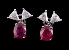 A pair of diamond and ruby earrings