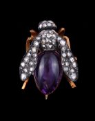 A diamond, ruby and amethyst bee brooch