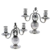 Georg Jensen, a pair of Danish silver Poppy twin light candelabra