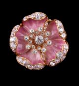 An early 20th century pink enamelled diamond set flowerhead brooch