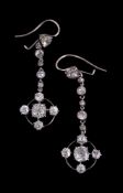 A pair of diamond drop earrings