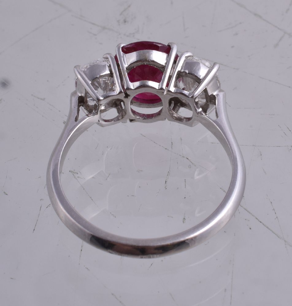 A ruby and diamond three stone ring - Image 2 of 2