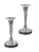 Georg Jensen, a pair of Danish silver Grape pattern large candlesticks