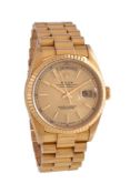 Rolex, Oyster Perpetual Day-Date, ref. 18238, an 18 carat gold bracelet watch