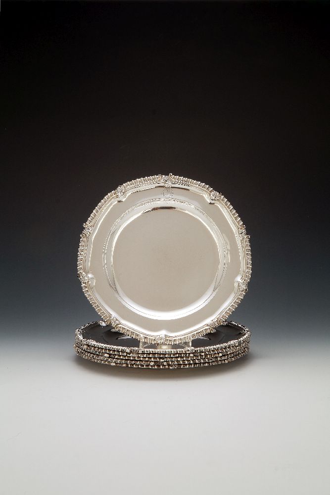 A set of six George IV silver shaped circular plates by John Mewburn