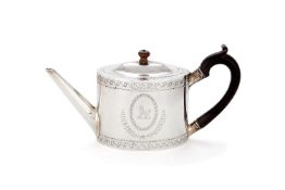 A George III silver straight-sided oval tea pot by John Harris III