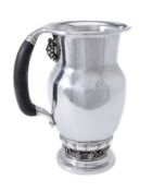 ϒ Georg Jensen, a Danish silver Grape pattern pitcher or jug