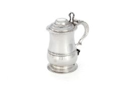 A George II silver baluster tankard by Henry Brind