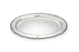 A George IV silver shaped oval meat plate by William Eley II