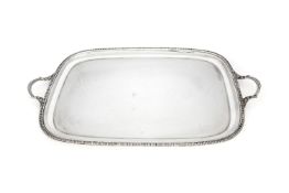 A silver twin handled rounded rectangular tray by Barker Brothers Silver Ltd