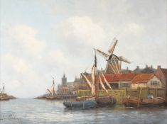 Jan Van Couver (Dutch 1836-1909)A pair of canal views with moored sailing barges