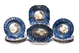 A Royal Worcester powder-blue ground part dessert service signed by C. Johnson