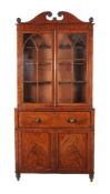 ϒ A Regency mahogany and rosewood banded secretaire bookcase