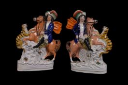 A pair of Staffordshire equestrian groups of tiger hunters