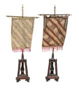 A pair of Egyptian Revival pole screens