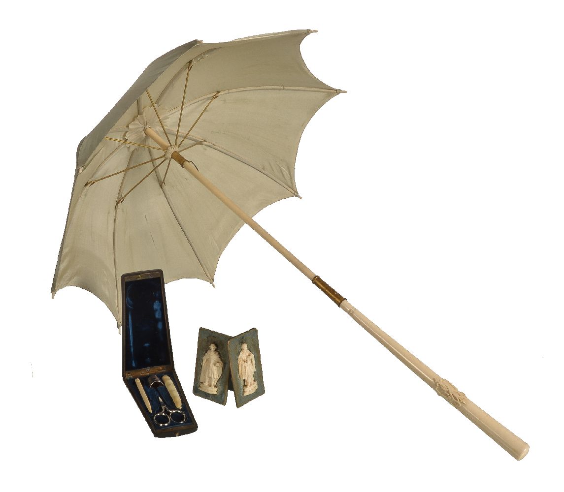 ϒ A French ivory, silk and gilt metal parasol by Dupuy of Paris