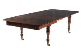 An early Victorian mahogany dining table