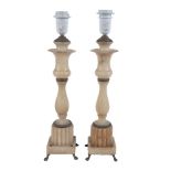 A pair of gilt metal mounted alabaster table lamps