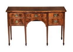 A George III mahogany and inlaid sideboard