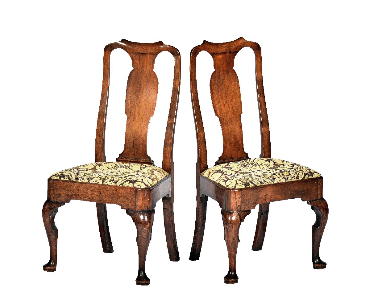 A pair of George II ‘red walnut’ chairs