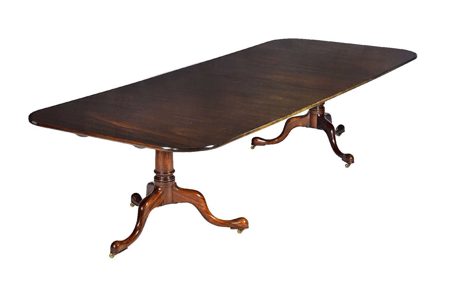 A mahogany dining table in George III style