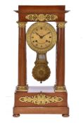 A Louis Philippe satinwood and gilt metal gilt-mounted Portico mantel clock