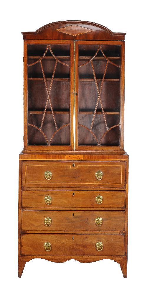 ϒ A George III mahogany and inlaid secretaire bookcase