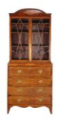 ϒ A George III mahogany and inlaid secretaire bookcase