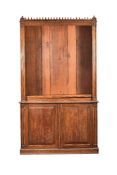 A Victorian Reformed Gothic oak bookcase cabinet