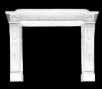 A carved variegated white marble chimneypiece in Louis XVI style