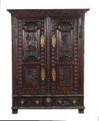 A Continental oak armoire in late 17th century style