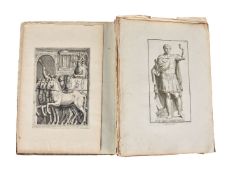 A bound book with etchings of classical figures