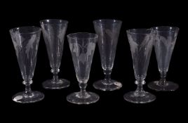 A group of six similar short ale glasses