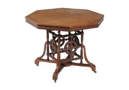An Aesthetic Movement walnut octagonal centre table