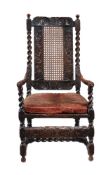 A Charles II walnut open armchair