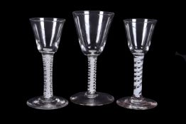 Three various opaque-twist wine glasses