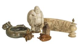 ϒ A Japanese ivory Okimono of Hotei