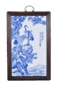 A large Chinese blue and white porcelain plaque