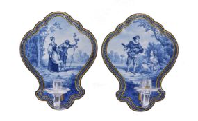 A pair of French fayence and clear-glass blue and white wall sconces