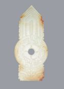 A Chinese celadon and russet jade archaic style bi