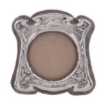 An Arts and Crafts silver small photograph frame by Gourdel Vales & Co.