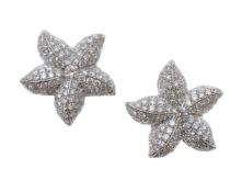 A pair of diamond starfish earrings