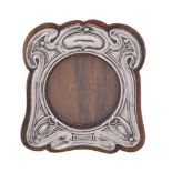 An Arts and Crafts silver small photograph frame