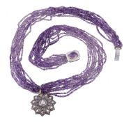 An amethyst and diamond necklace