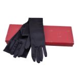 A pair of black nylon evening gloves