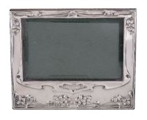An Arts and Crafts silver photograph frame by Marks & Cohen