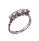 An 18 carat gold diamond five stone ring